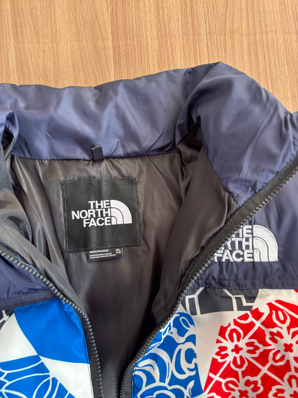TNF 1996 Retro Nuptse Jacket in the Blue IC Geo Print