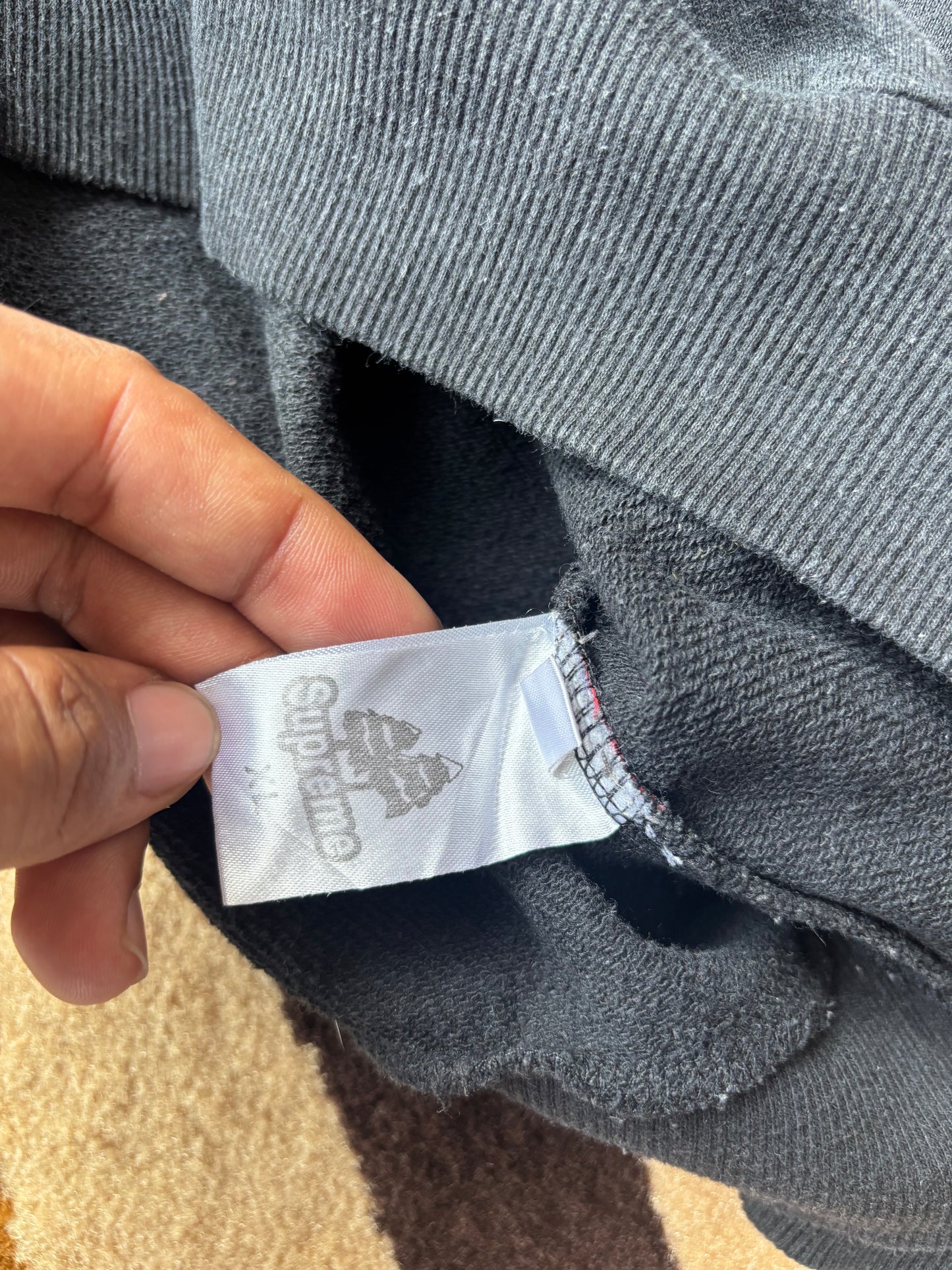 supreme universal studio tag sweatshirt
